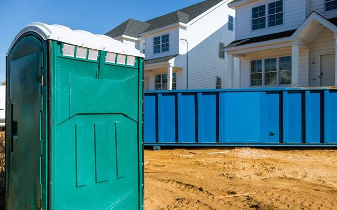 dumpster and portable toilet at a construction site in Norristown PA